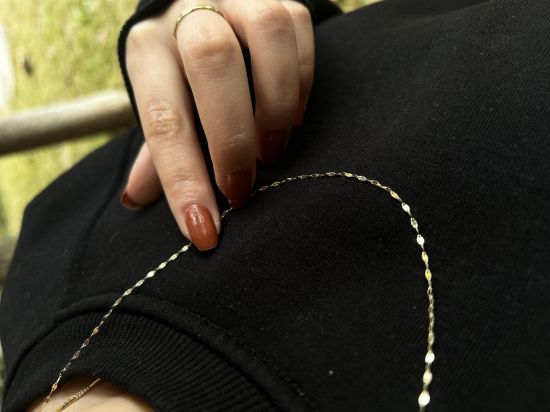 "Kelebek zincir kolye, 1,03 gram tasarımıyla Altın Kolye kategorisinde, Goldium imzasıyla modern bir görünüm sunar