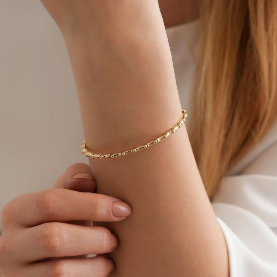 "14 Ayar Toplu Altın Bileklik, 6,67 gram, Goldium ustalığı ve Altın Dorika Toplu Bileklik modeli ile uzun ömürlü kullanım sağlar