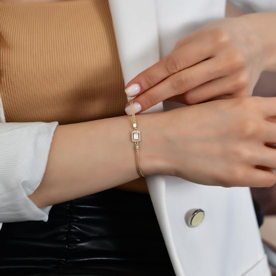 "14 Ayar Altın Baget Taşlı Bileklik, 4,44 gram, Goldium ustalığı ve Altın Bileklik modeli ile uzun ömürlü kullanım sağlar