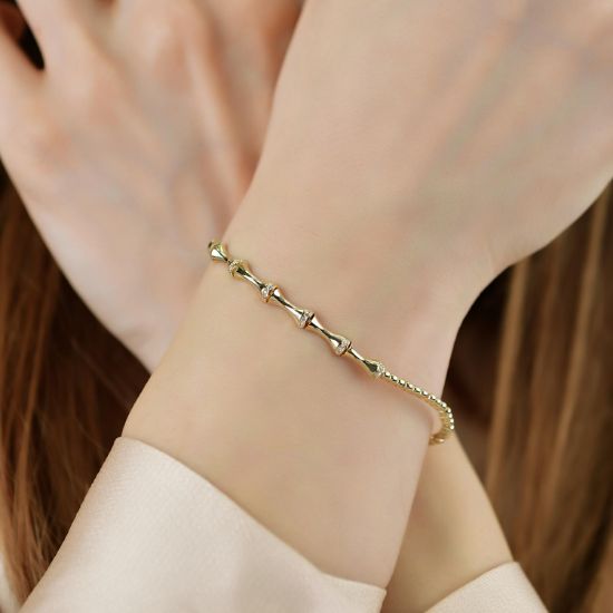 "14 Ayar Altın Yarım Model Bileklik, 5,25 gram, Goldium ustalığı ve Altın Bileklik modeli ile uzun ömürlü kullanım sağlar