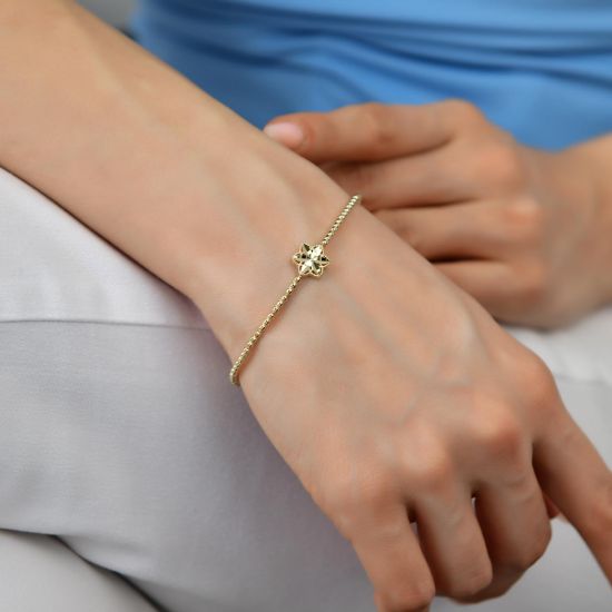"14 Ayar Altın Sıralı Çiçekli Bileklik, 4,95 gram tasarımıyla Altın Bileklik kategorisinde, Goldium imzasıyla modern bir görünüm sunar