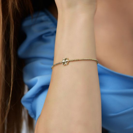 "14 Ayar Altın Sıralı Çiçekli Bileklik, 4,95 gram tasarımıyla Altın Bileklik kategorisinde, Goldium imzasıyla modern bir görünüm sunar