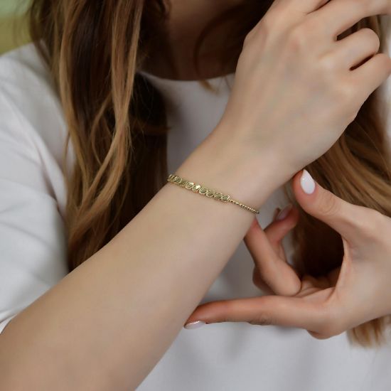 "14 Ayar Altın Elips İşlemeli Bileklik, 5,94 gram olup Altın Bileklik modellerinden biridir. Ağırlığı ve zarif tasarımıyla stilinizi tamamlar