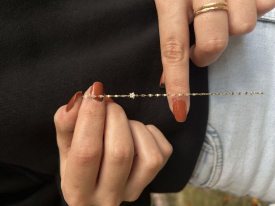 Kelebek Zincir Taşlı Yıldız Bileklik, 0,71 gram ve özenli işçilikle Altın Yıldız Bileklik’in günlük ve özel kullanıma uygun bir Goldium modelidir.