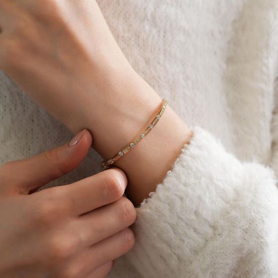 "14 Ayar Altın Fantezi Bileklik, 7,58 gram, Goldium ustalığı ve Ebru Sever Türk'ün Favorileri modeli ile uzun ömürlü kullanım sağlar